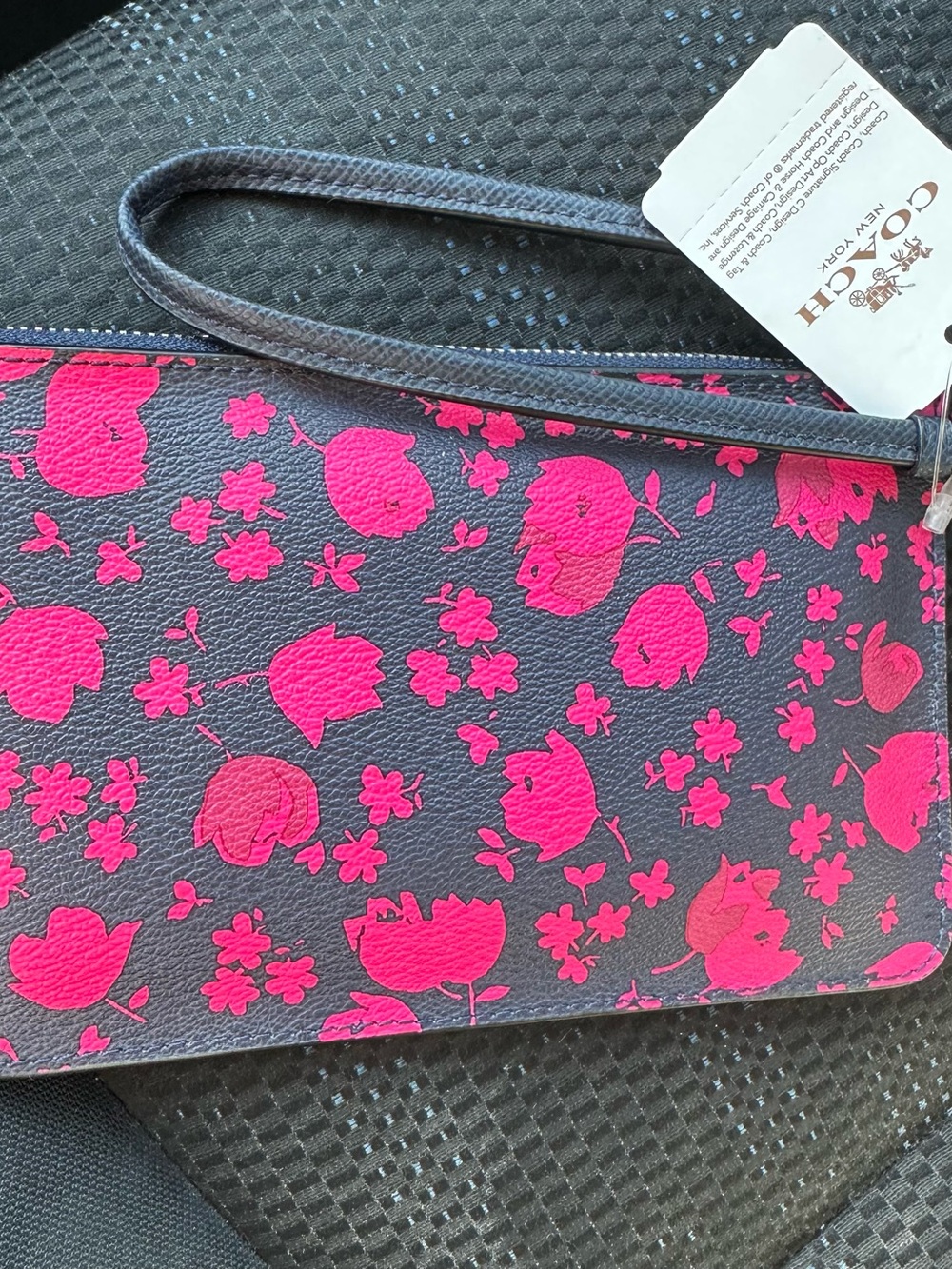 Coach Wristlet with Bright Pink Floral Pattern